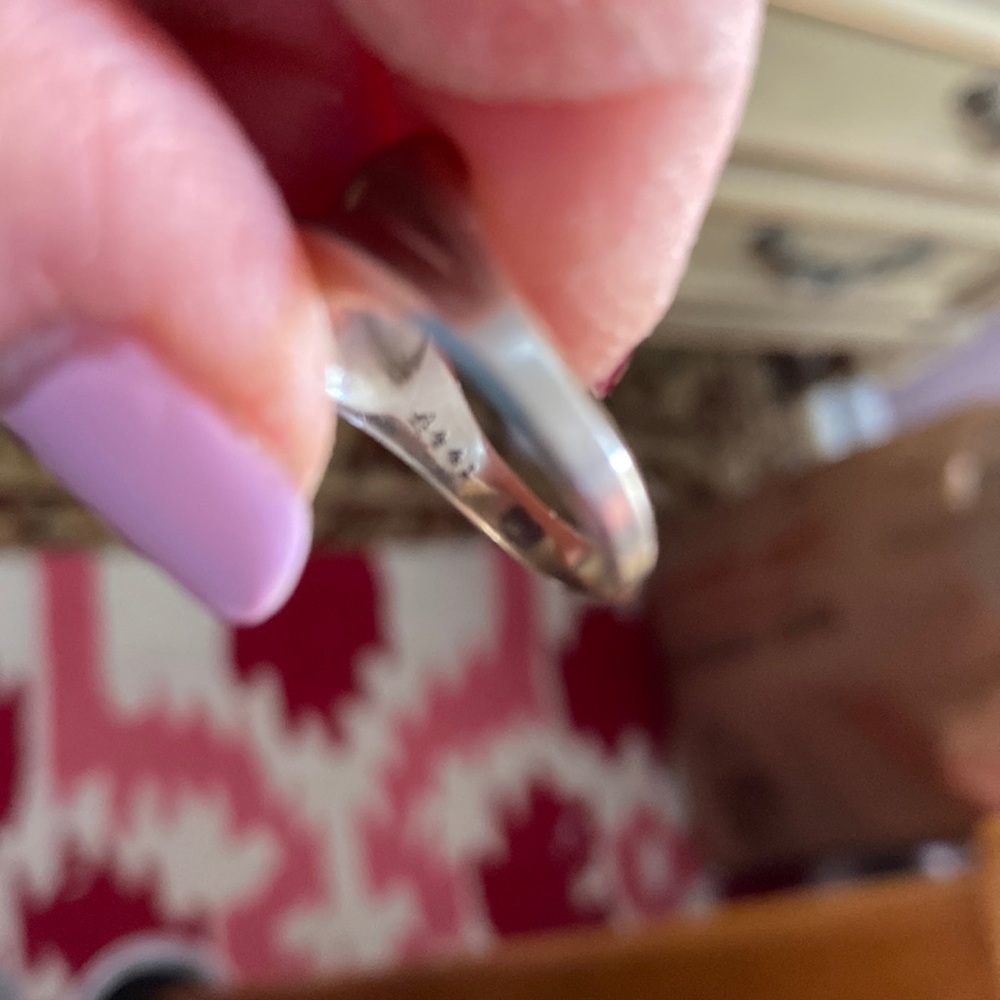 A man’s pinky ring